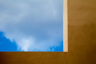 A window abstract with clouds on the beautiful island of Santorini.
