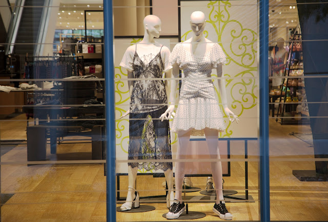 Two mannequins in the window, the Domain, Austin, Texas, USA