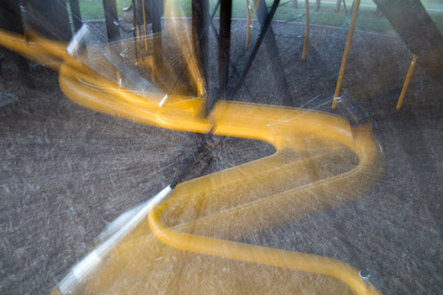 Yellow water like slide, in the playground in Cedar Park, Texas