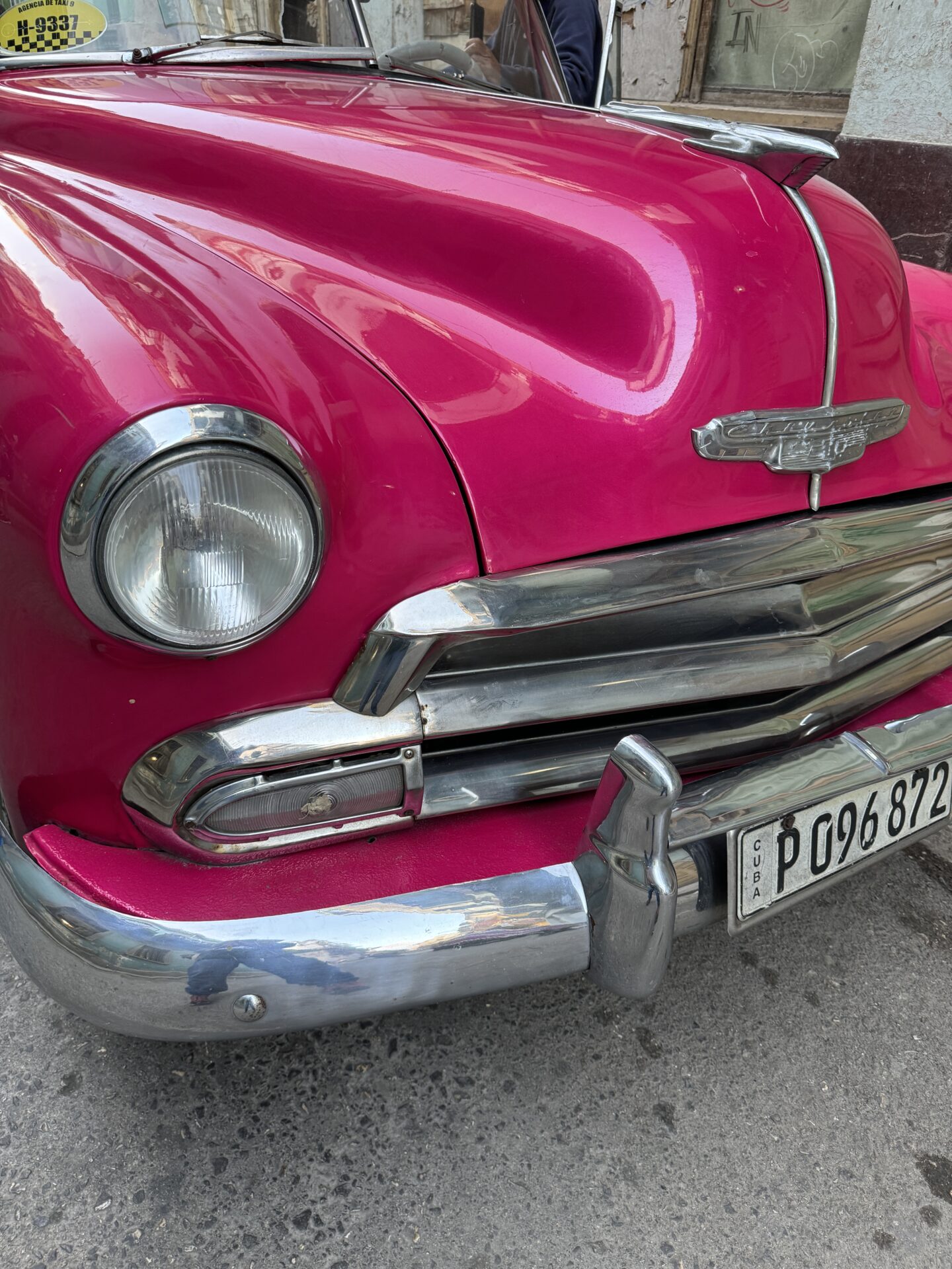 Bright pink classic car in Old Havana, by Carol Schiraldi of Carol's Little World