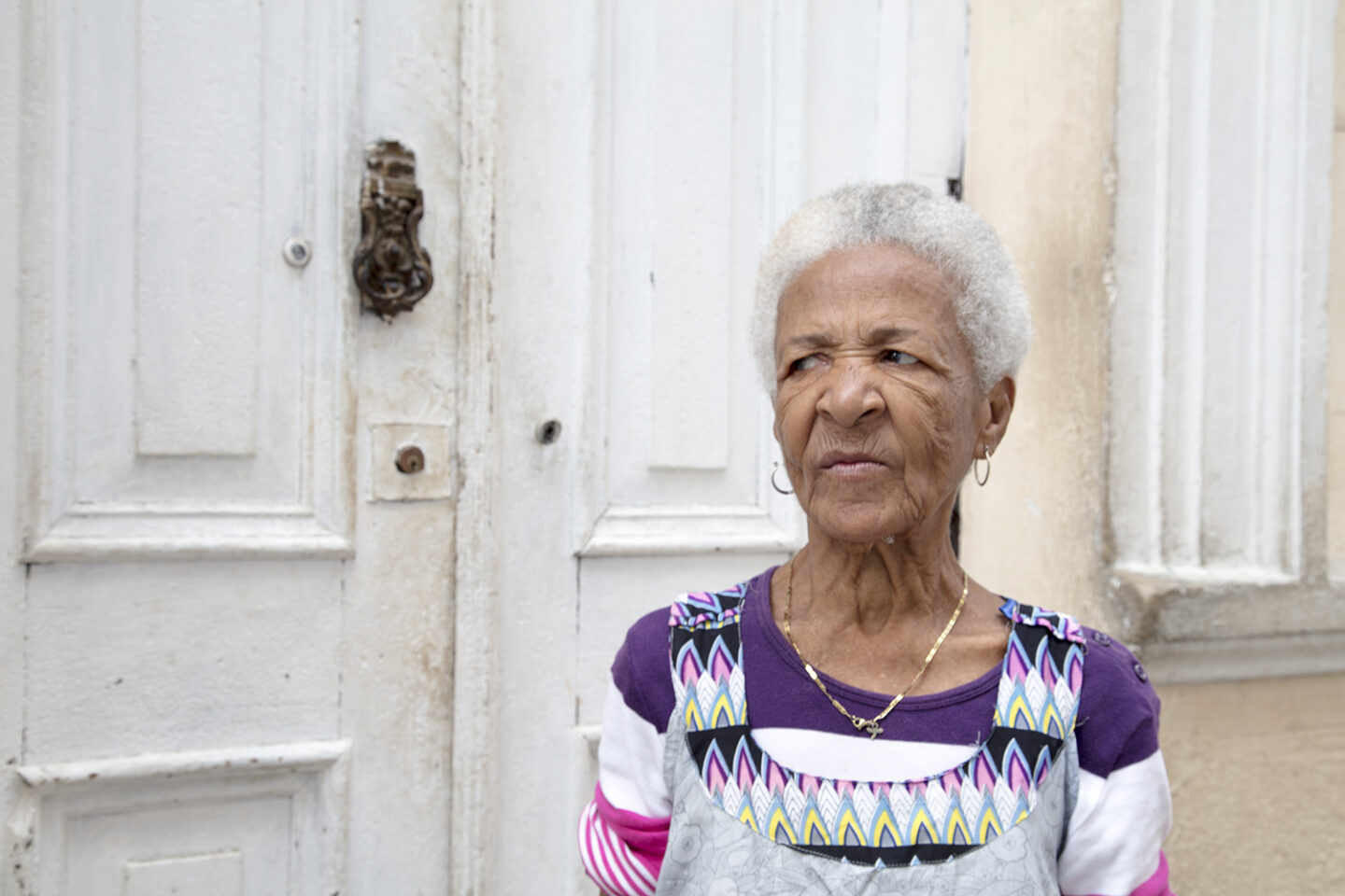 Portrait of a women after sharing a joke from the streets of Havana Cuba from the Portraits of Cuba series 